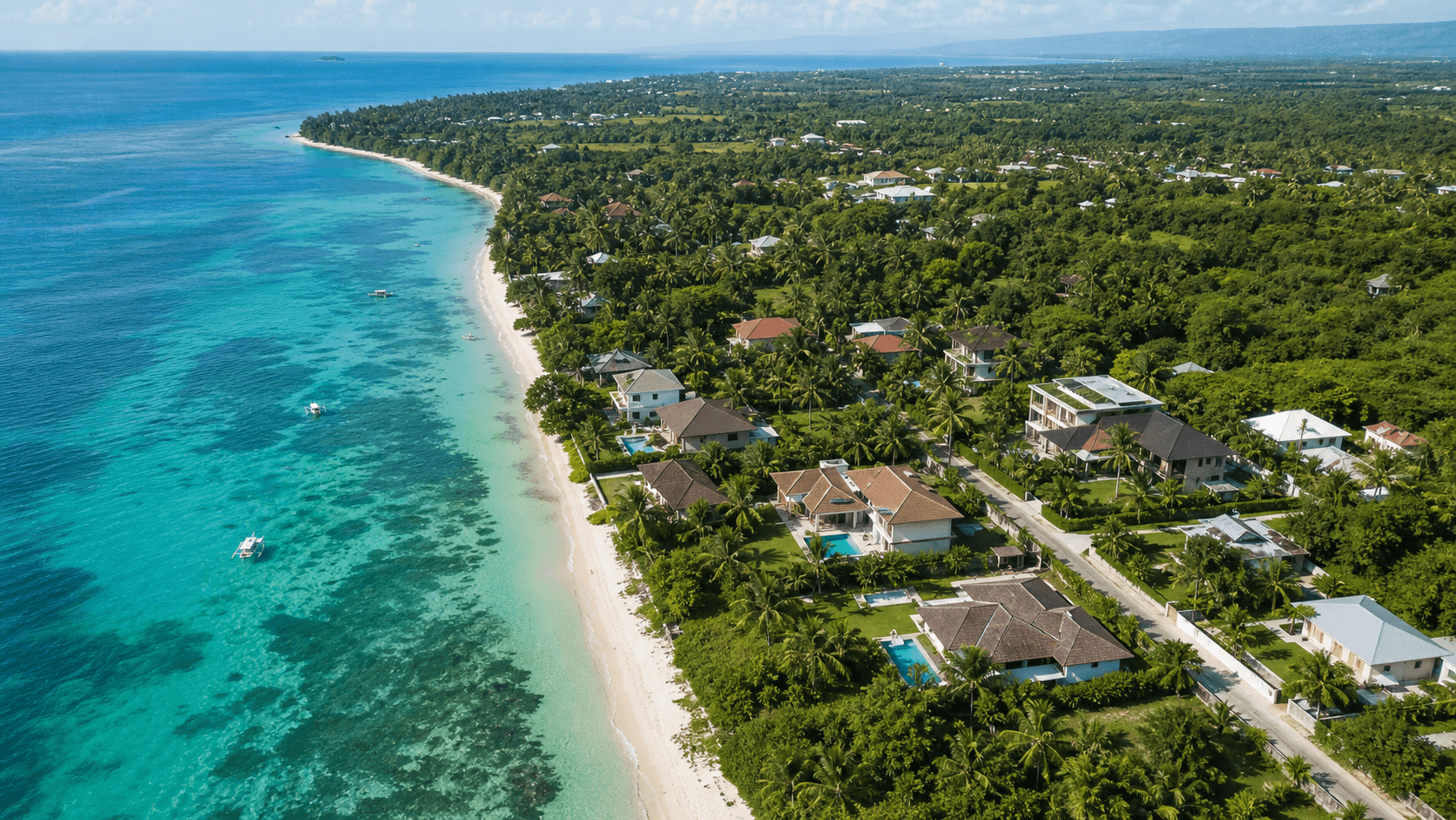 Aerial view of Panglao coastline and homes
